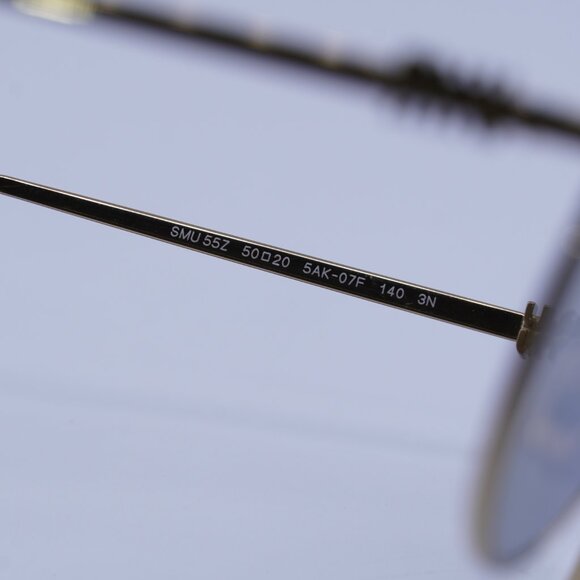 Miu Miu MU55ZS 5AK07F Sunglasses Gold Round Frame